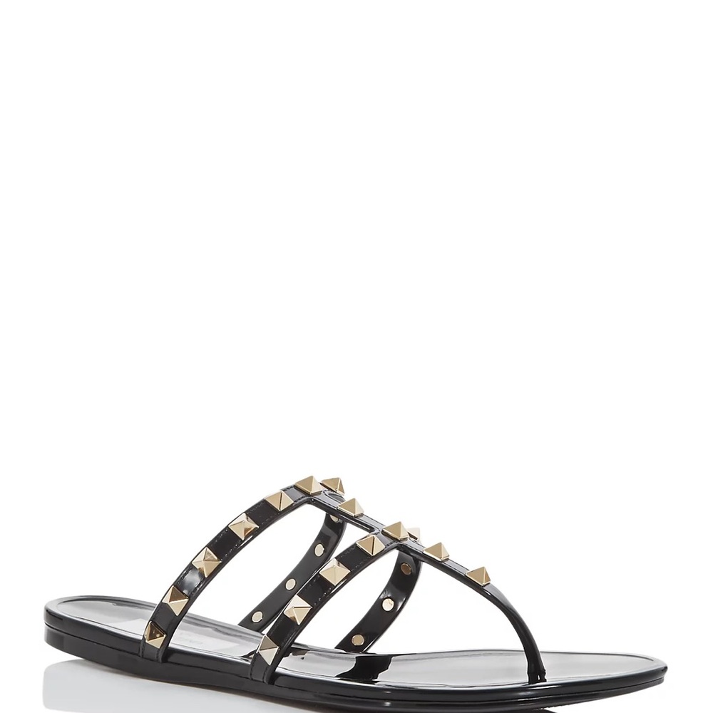 Valentino Garavani PVC sandals with signature Rockstud trim.